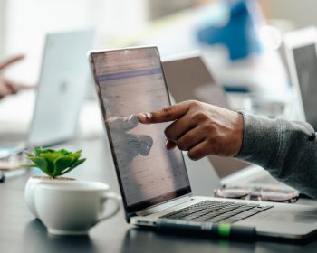 burst_man-pointing-at-laptop-screen-analytics